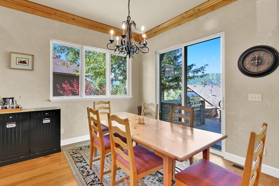 Our warmly lit dining area has views of Snowbasin and Nordic Valley resorts.