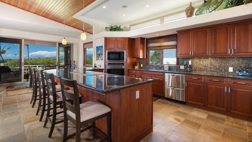 Gourmet kitchen with high end appliances. Enjoy cooking delicious island inspired meals