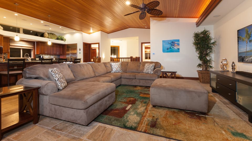 Open concept great room with large comfy sectional