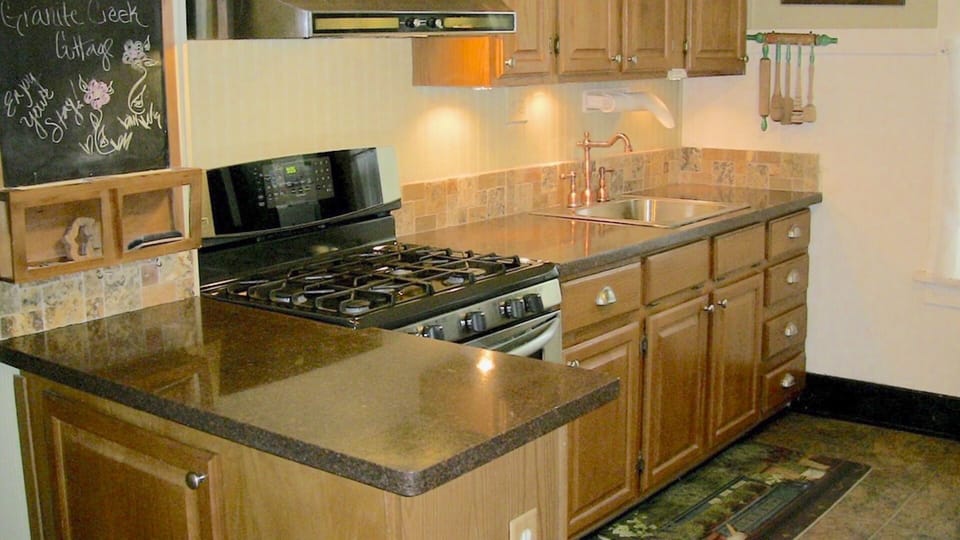 Kitchen stocked with useful utensils