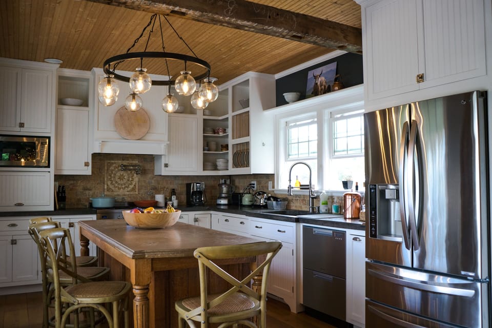 Healing Waters farmhouse kitchen with seating.