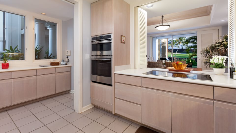 Spacious gourmet kitchen with a great assortment of spices, oil and essentials for cooking