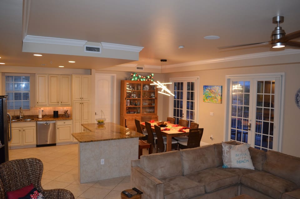There is a nice view from the living looking at the dining table that seats 8.