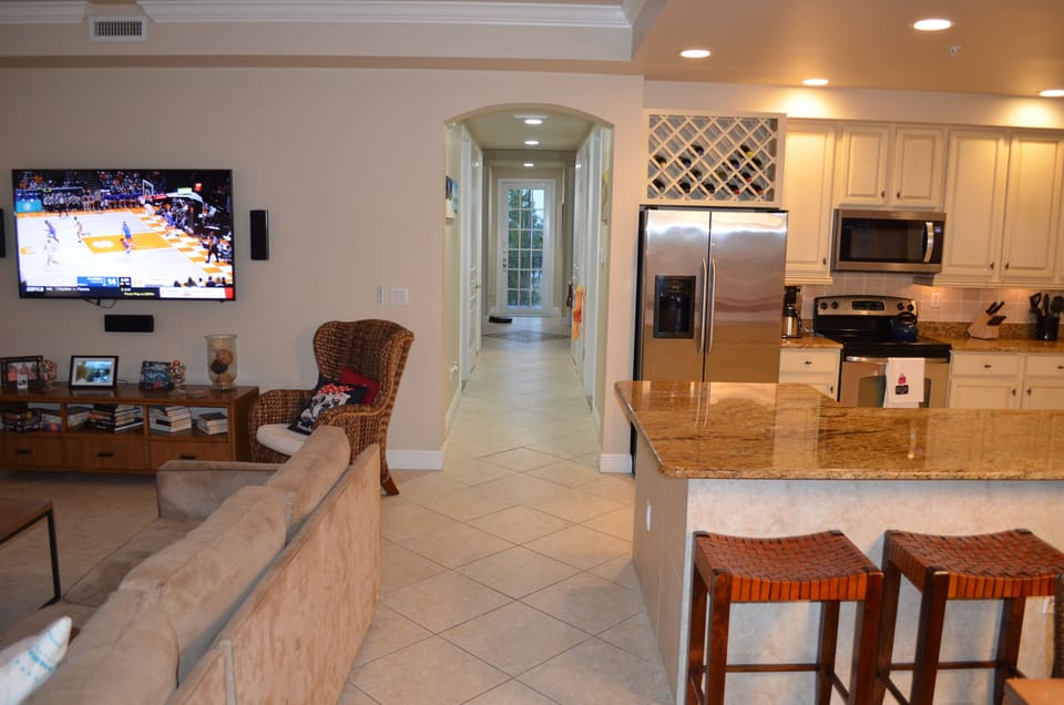 There is a lovely long hallway to the bedrooms and bathrooms.