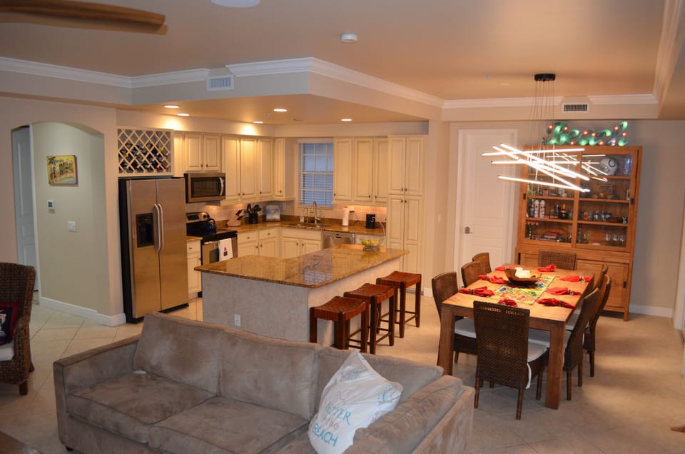 The kitchen and dining area are open and comfortable for all your guests.