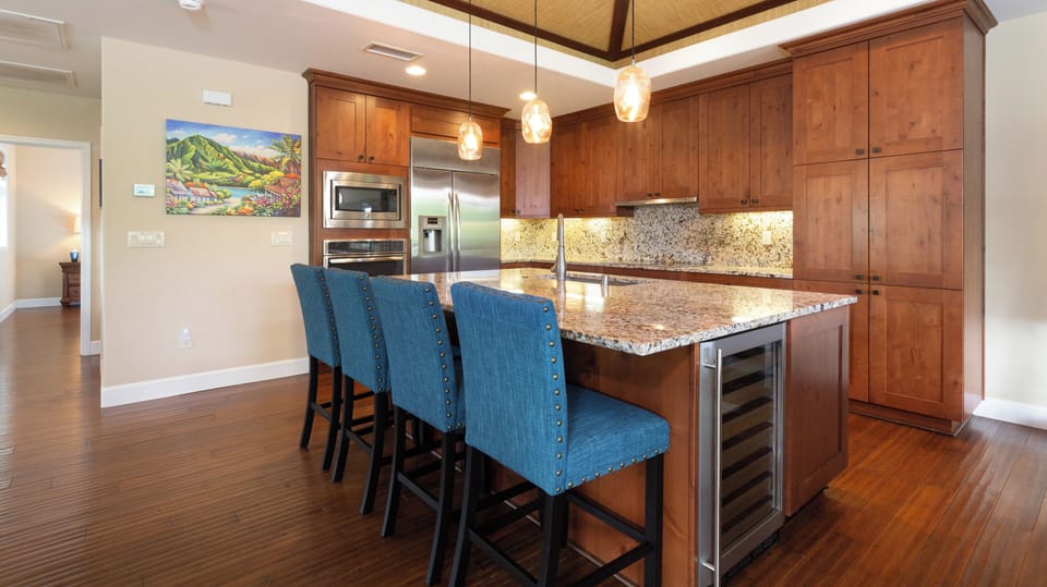 Large kitchen Island with additional seating and Wine Fridge