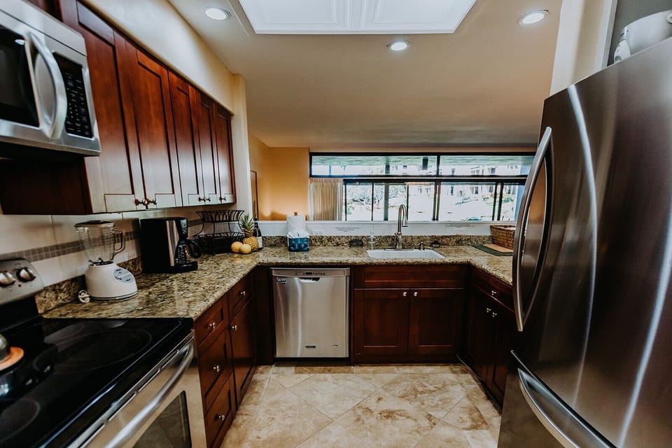Full kitchen with stainless steel appliances