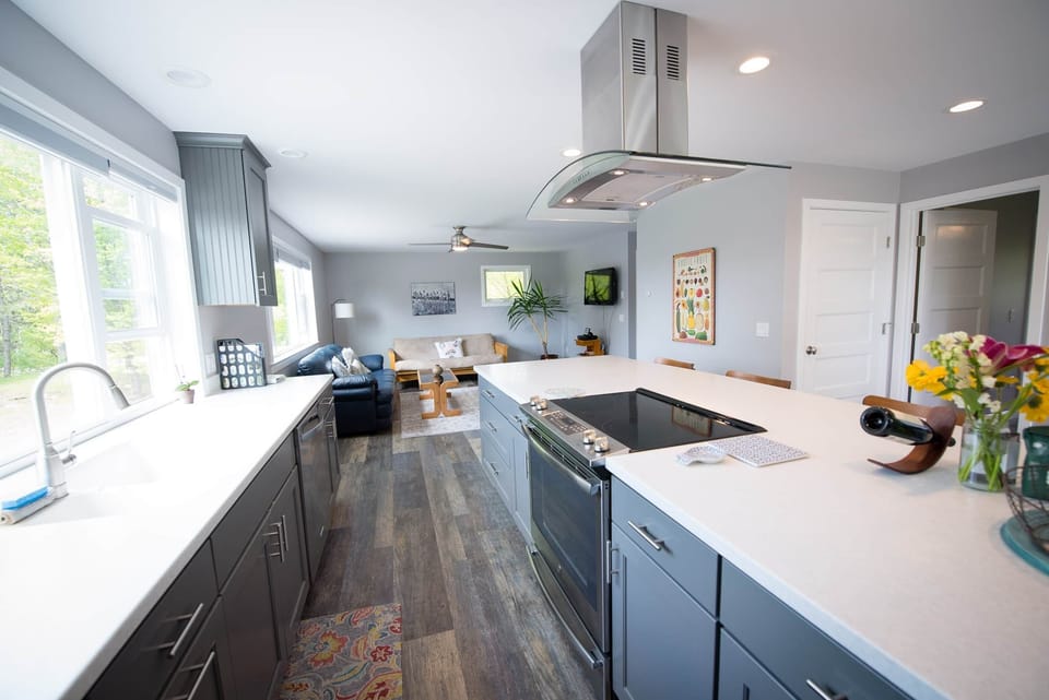 Kitchen space is wide open to living room giving this space a large feel