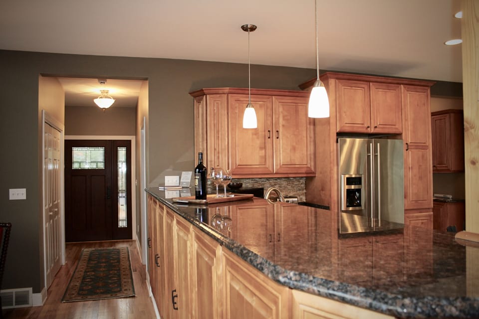 Upscale kitchen to side entryway