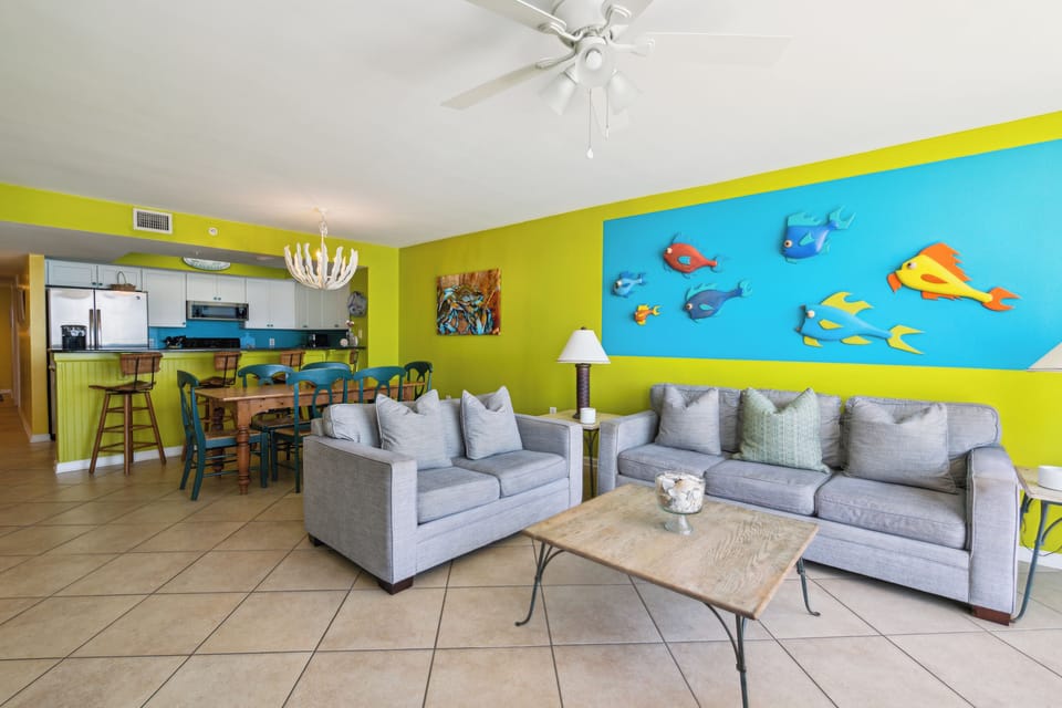 Enjoy the beach front living room, with plenty of seating.