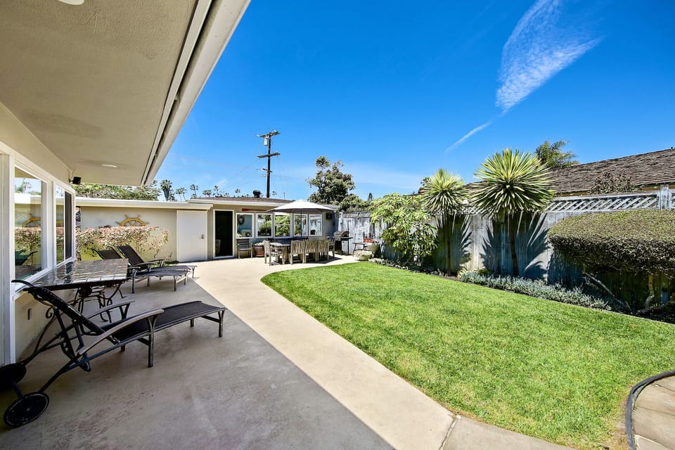 Step out from the living room into a beautiful secluded back yard