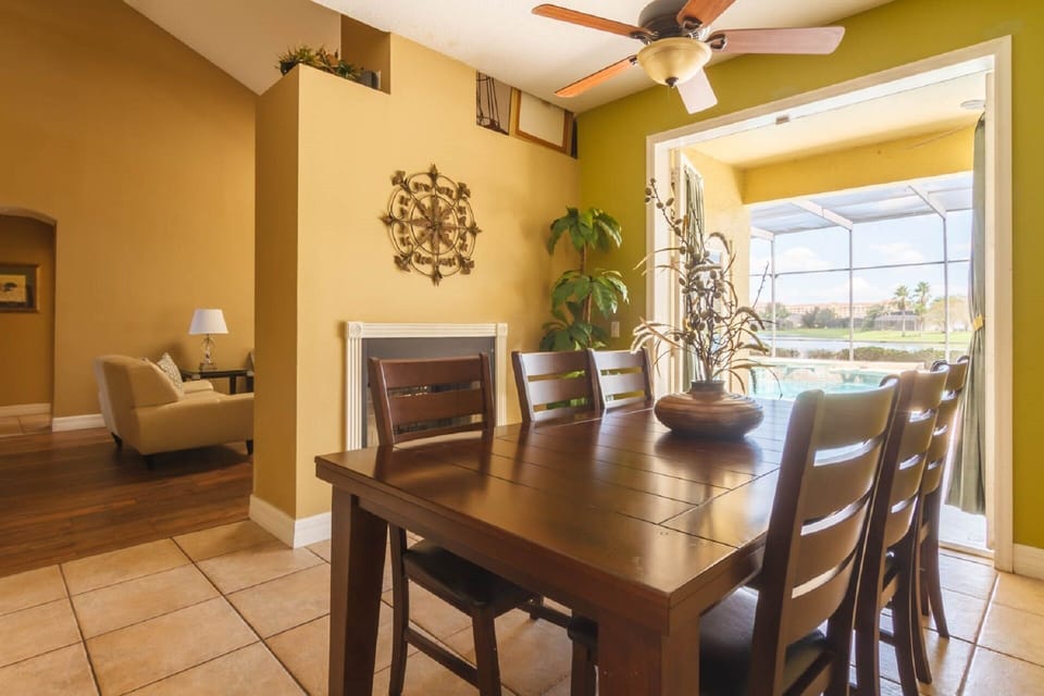 A breakfast nook leading to the pool