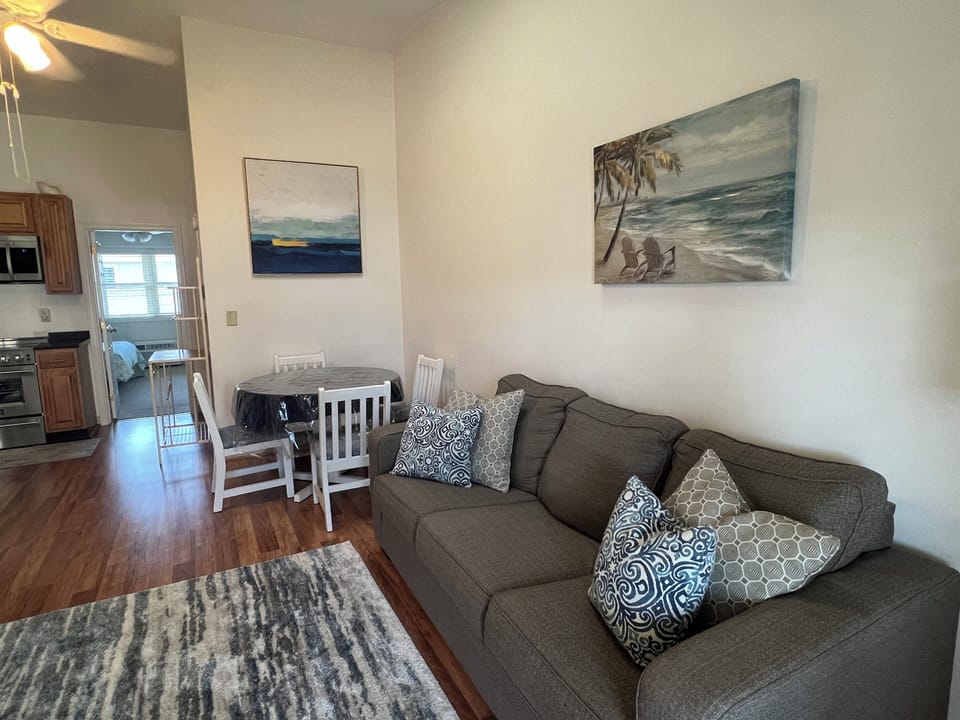 Sofa bed and 4-seat dining area