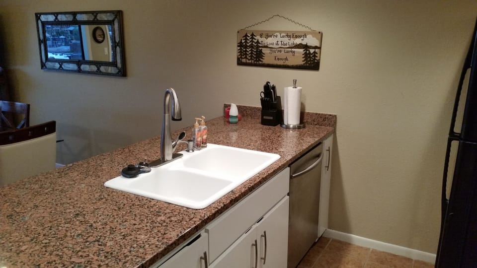 Kitchen to Dining easy access w/dishwasher