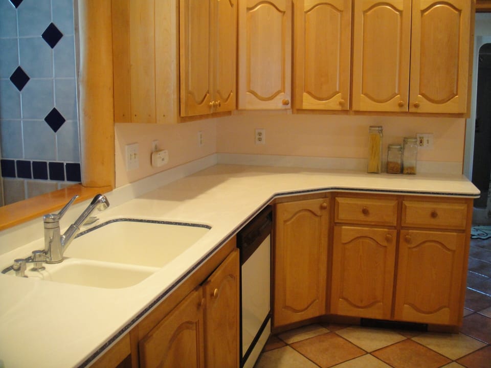 Plenty of room to prepare meals, as you look out over the lake.