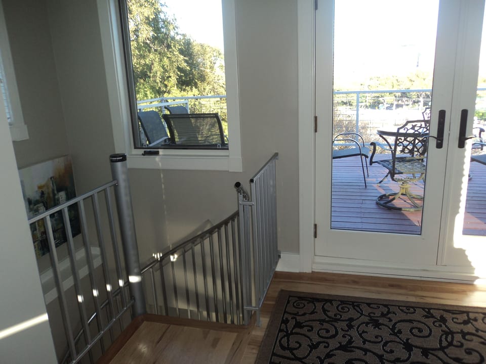 2nd floor view of spiral staircase and terrace