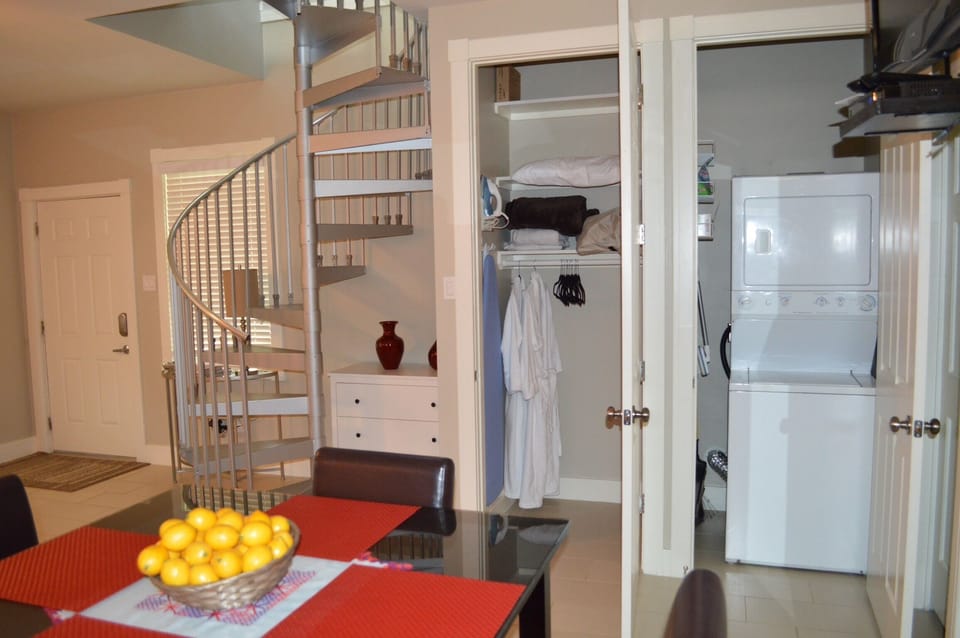 1st floor has open floor plan with closet and washer/dryer