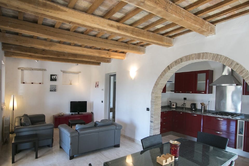 Lower dining lounge and kitchen leading to terrace