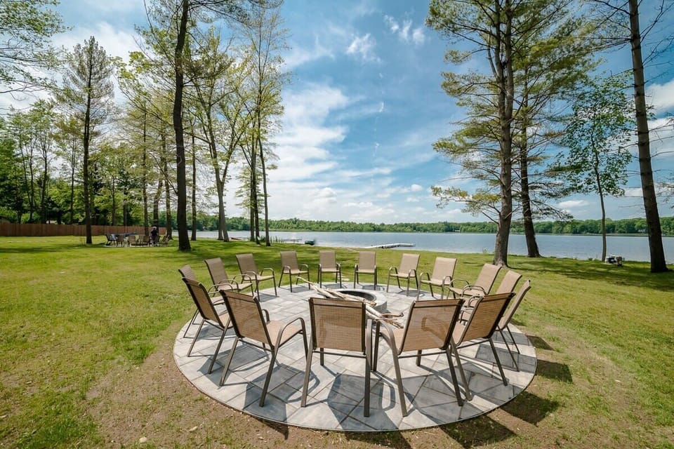 Fire pit area near the private beach and dock, looking out over Upper Scott Lake