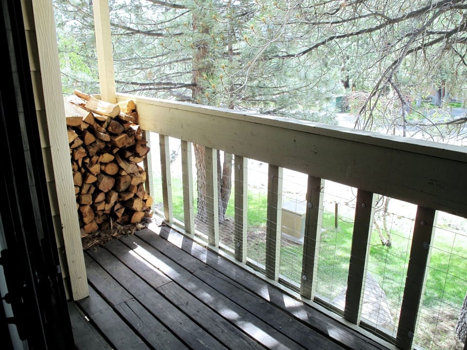 Balcony with plenty of Firewood.