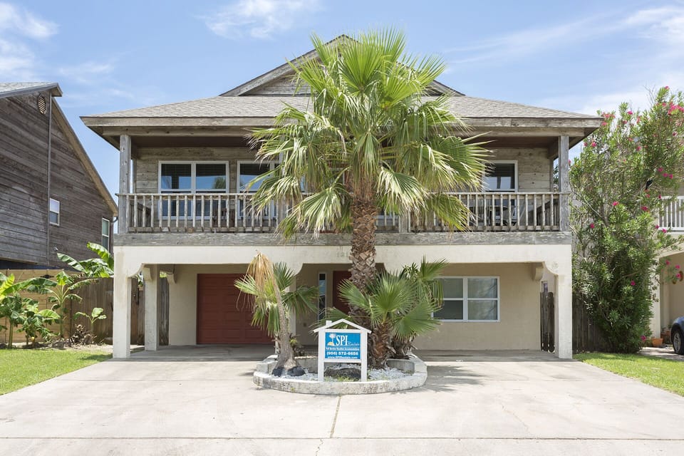 Beautiful beach house with a private pool, hot tub, and an unbeatable island location.
