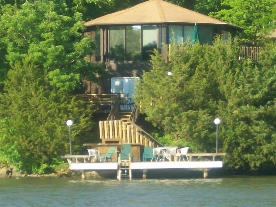Three levels of decks/martini deck in water middle deck and upper deck with BBQ