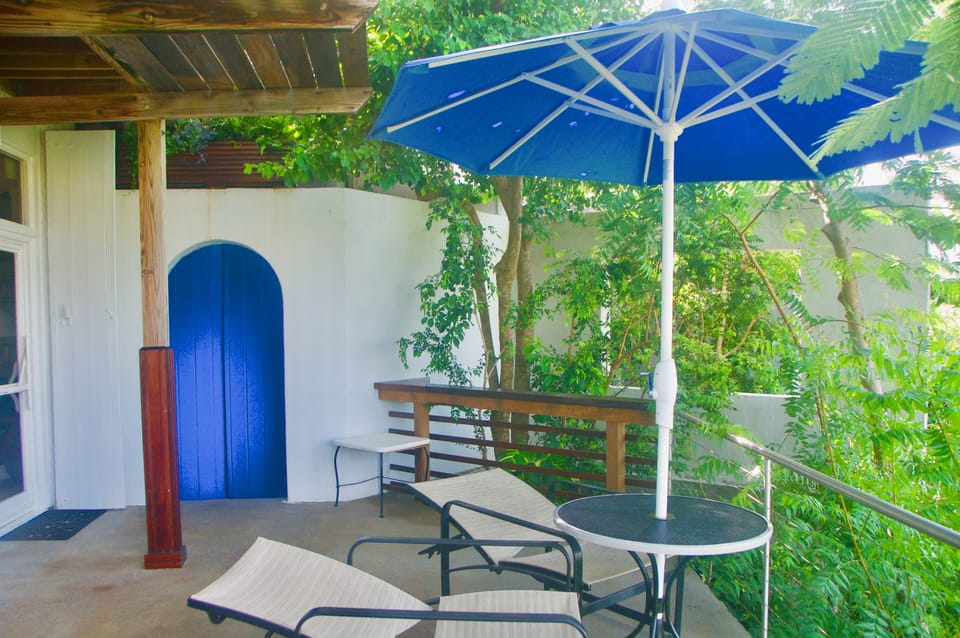 ... the privacy wall includes an open 'window' to allow breeze passage