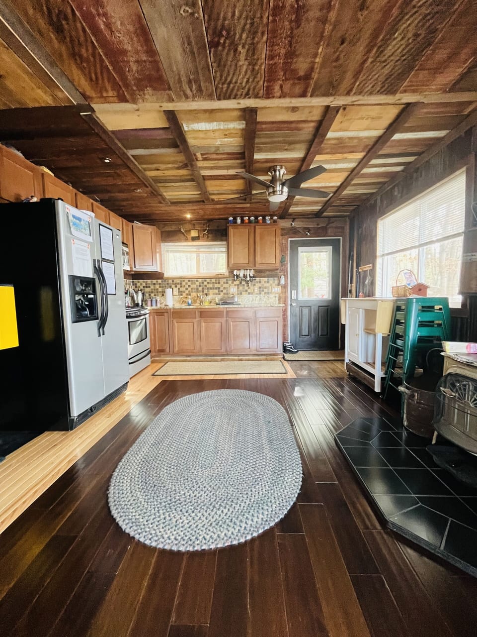 Kitchen and small breakfast bar (on wheels can pull out) and 4 stools