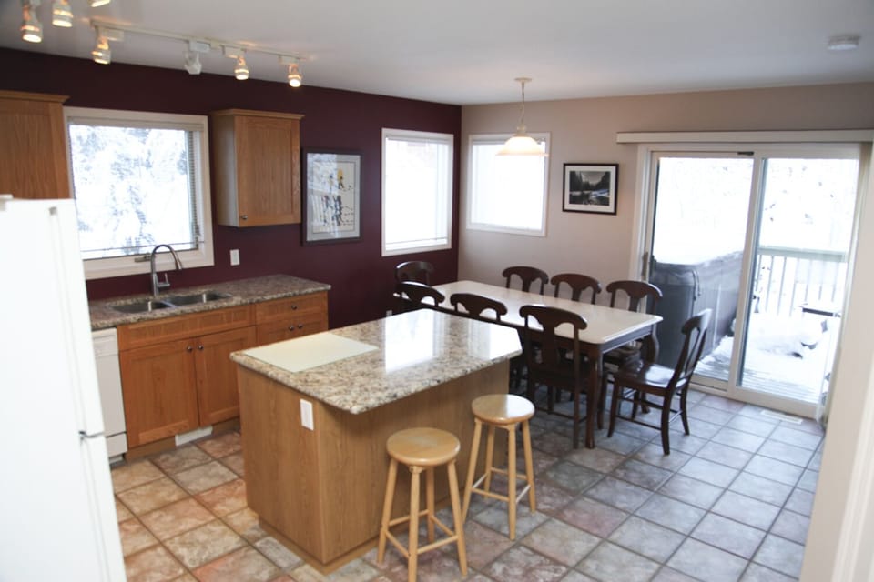 Kitchen view with 6 person private hot tub on back deck