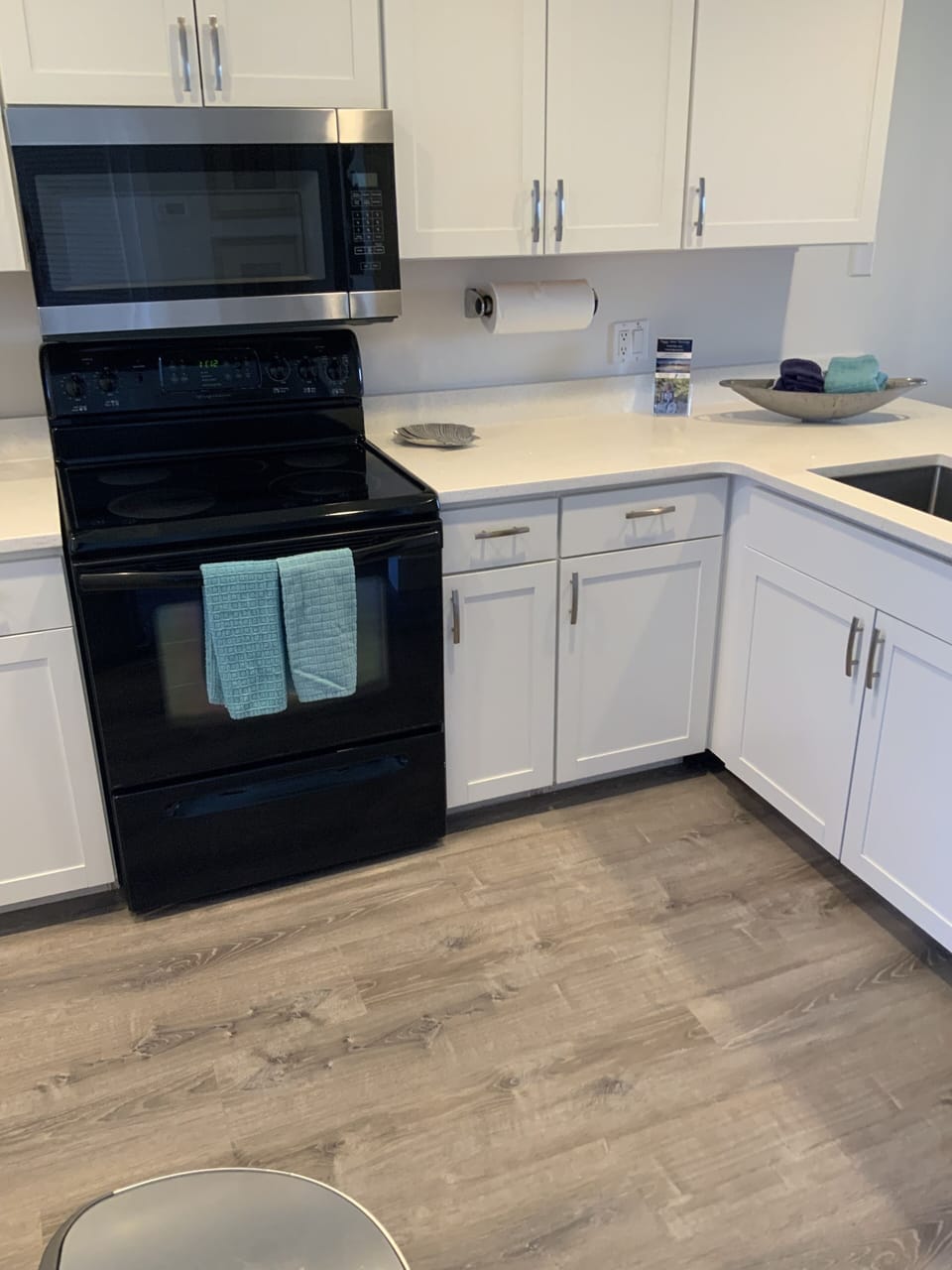 white cabinets /quartz tops / quality appliances