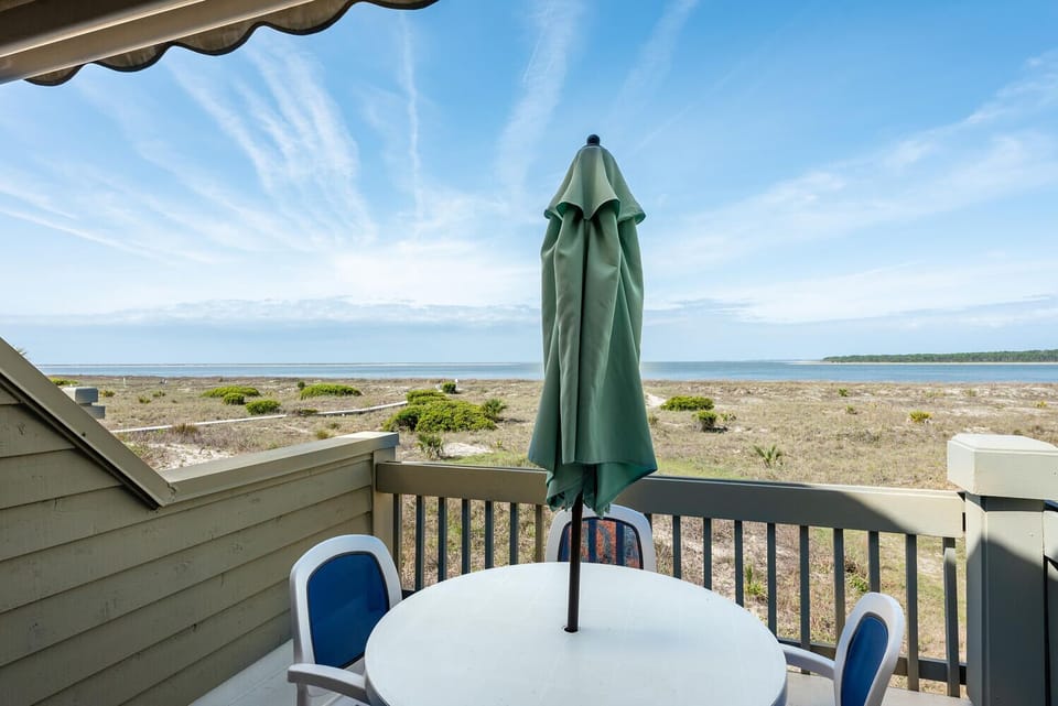 Welcome to 13108 Pelican Watch Villa! A private second floor end unit and perfect spot for sunsets!!