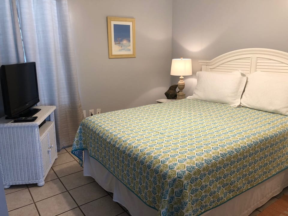 Flat screen TV with DVD player in bedroom