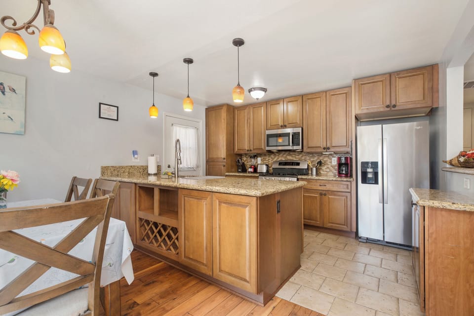 Prepare your own meal in this spacious and well equipped kitchen. Permit #str21-1275