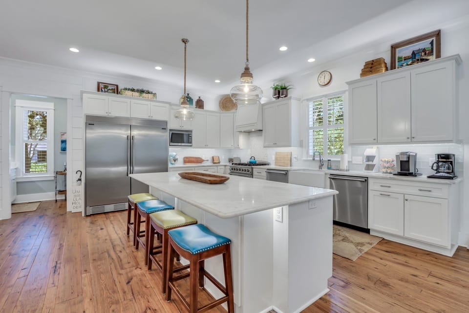 Open kitchen with island seating for four