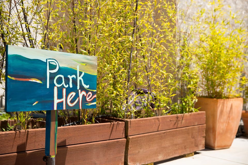 One parking space is available in private off street lot.