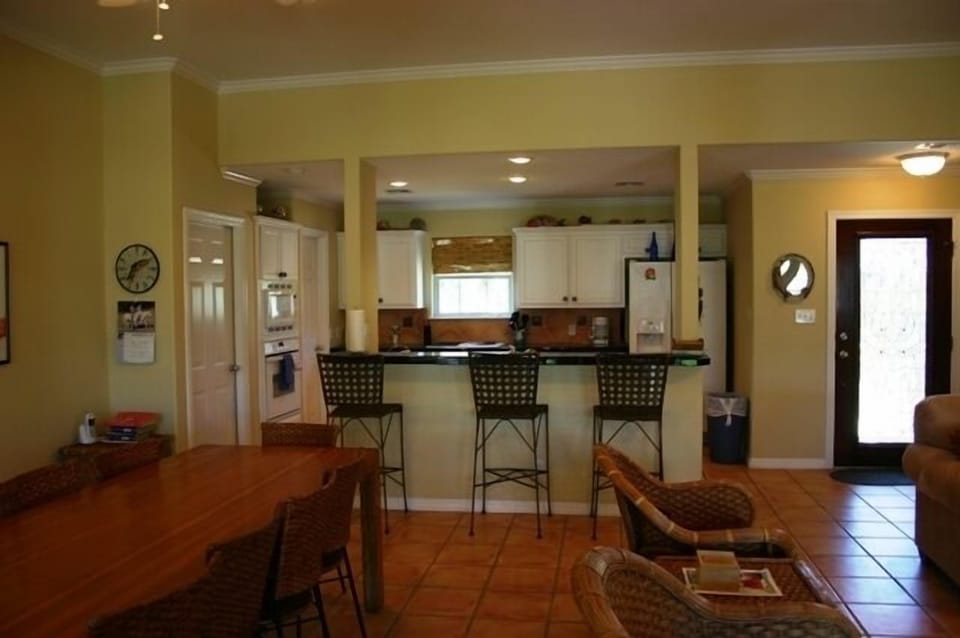 kitchen open to dining and living rooms