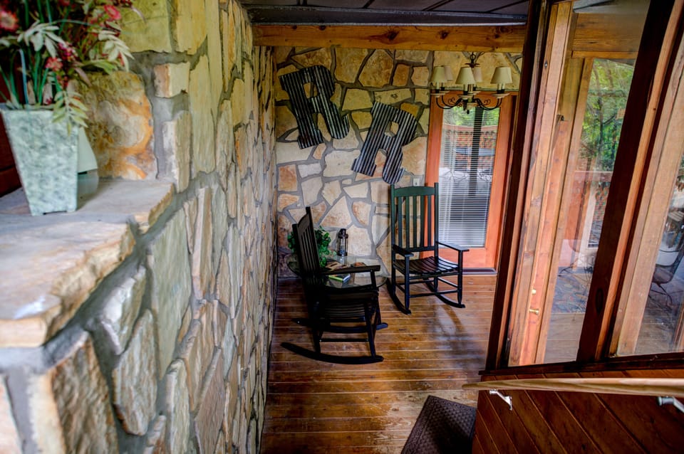 Continuing down the enclosed staircase to the Master Suite lower level.