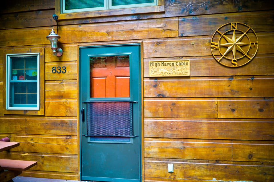 The front door with our sign.  The compass is symbolic of your path and arrival.