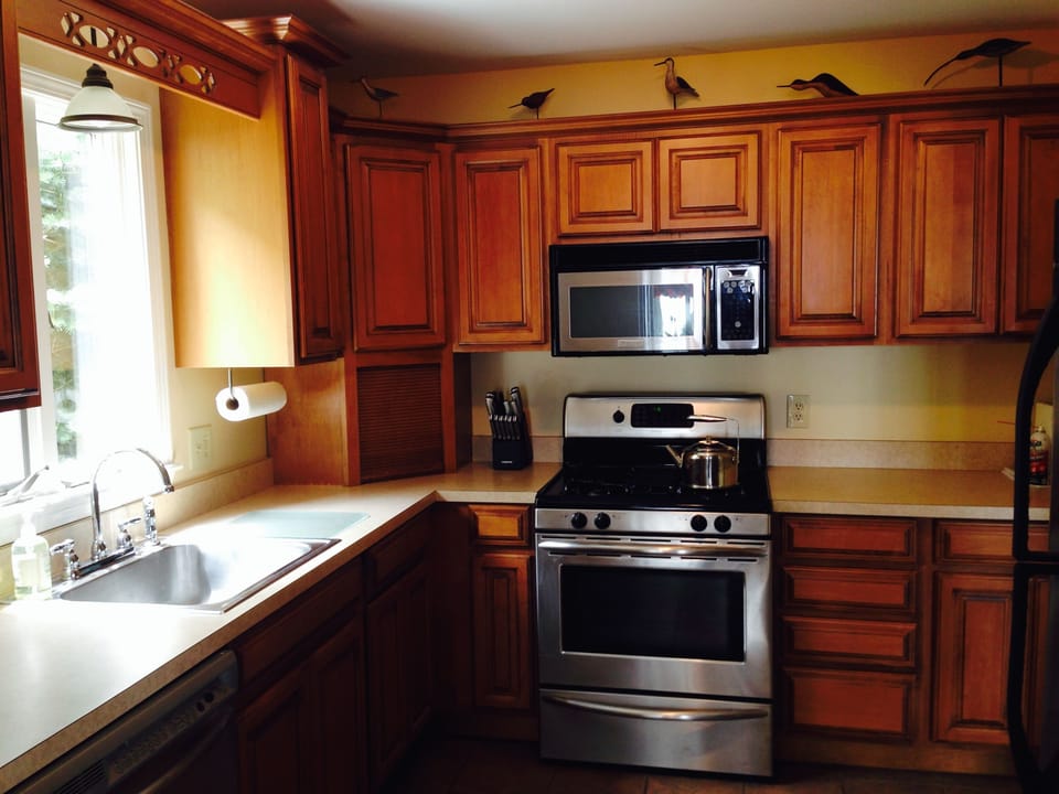 Kitchen: features appliances with stainless steel, and latest fixtures.