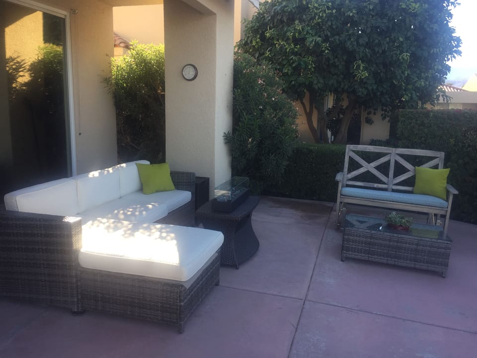 Comfortable patio furniture to sit back, relax and take in the views.