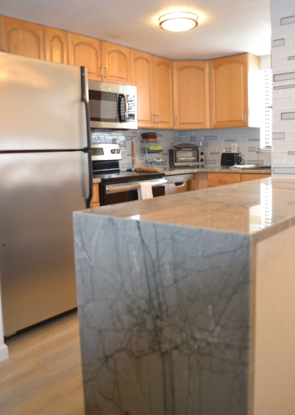 Kitchen, refrigerator, microwave, dishwasher, toaster oven, coffee maker, etc.