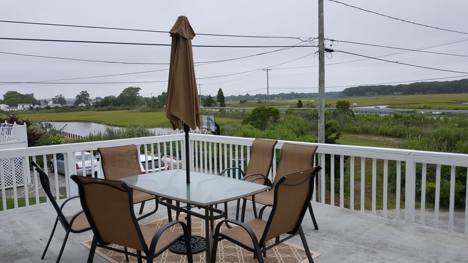 Rear deck with salt marsh view.