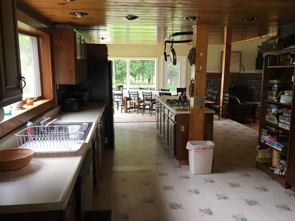 Large full kitchen and open dining area.