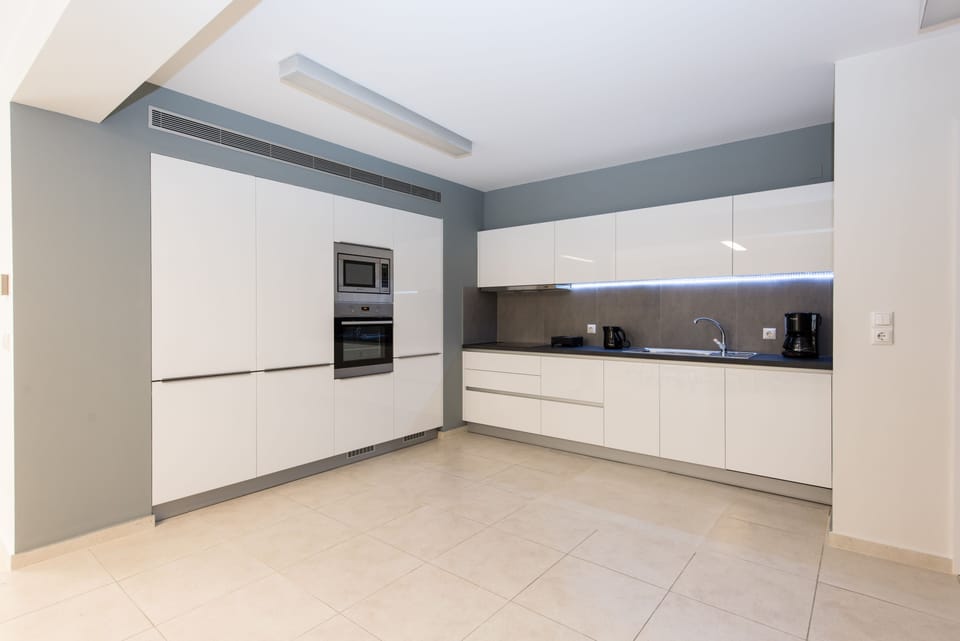 Fully equipped kitchen. Dish washer, fridge, refrigerator stove and microwave