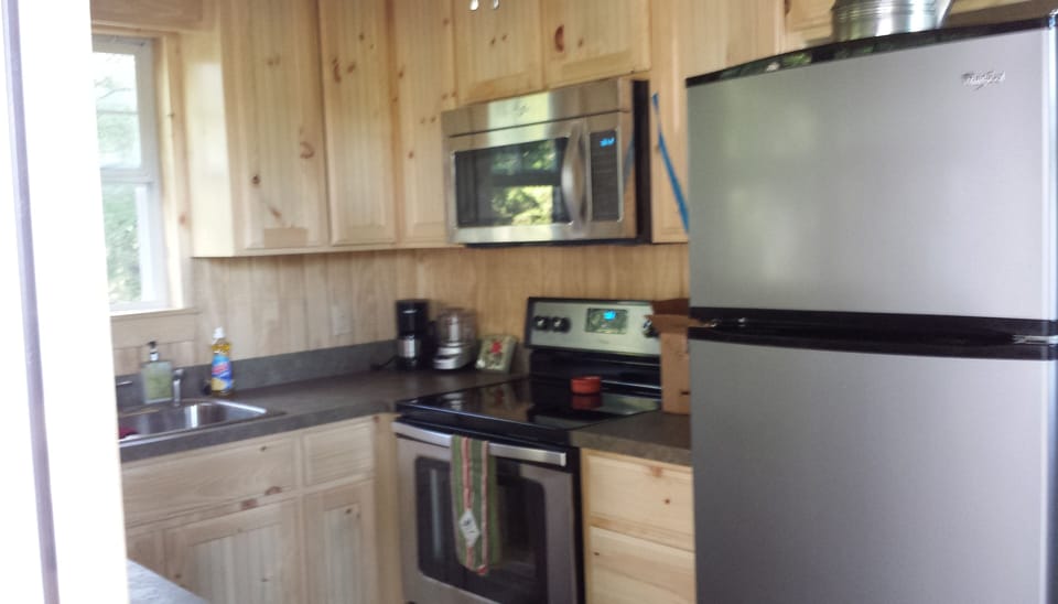 The kitchen area has many of the items you have in your own kitchen. 