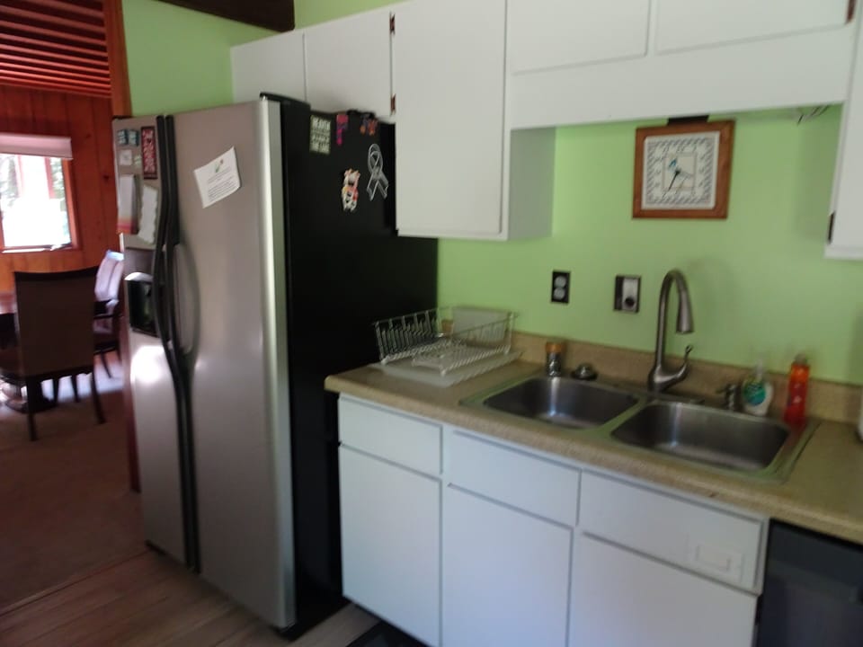 Refrigerator & Sink area.