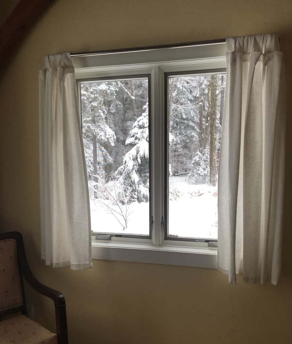 bedroom window with snow
