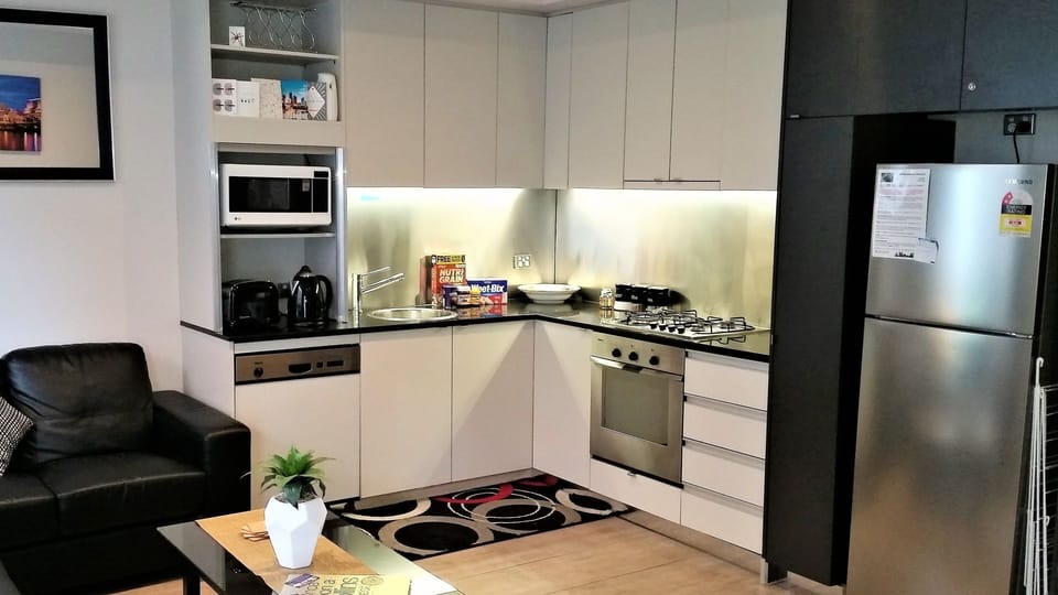 Full stocked Kitchen with cooking utensils and cleaning products.
Dishwasher