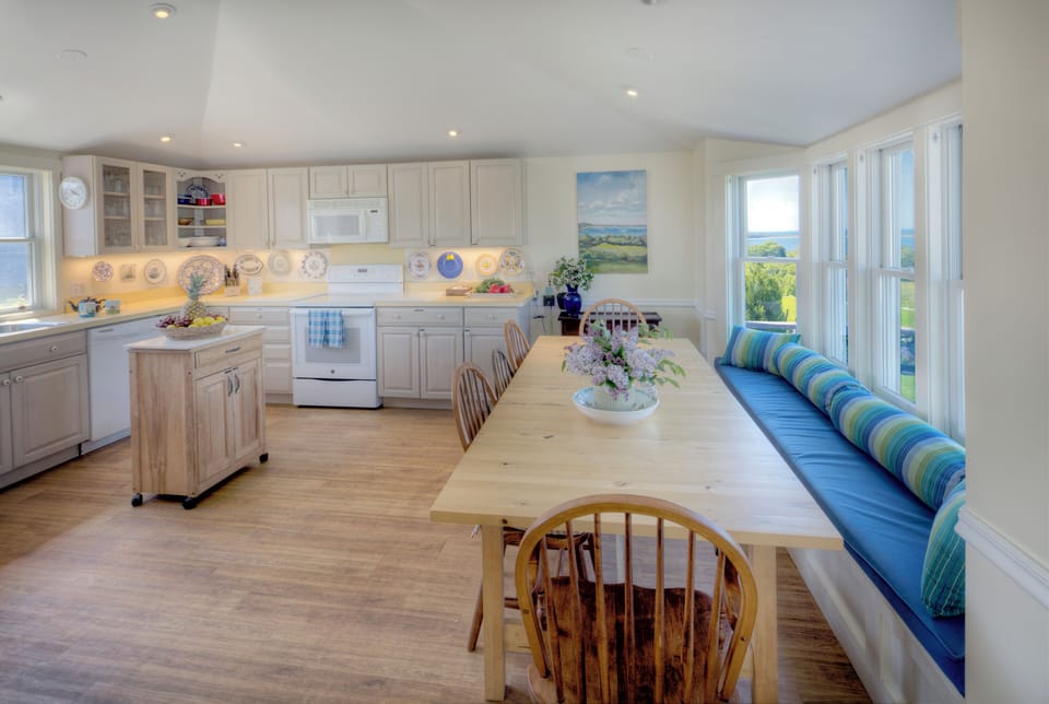 The big, well-equipped kitchen captures sunlight all morning and afternoon too