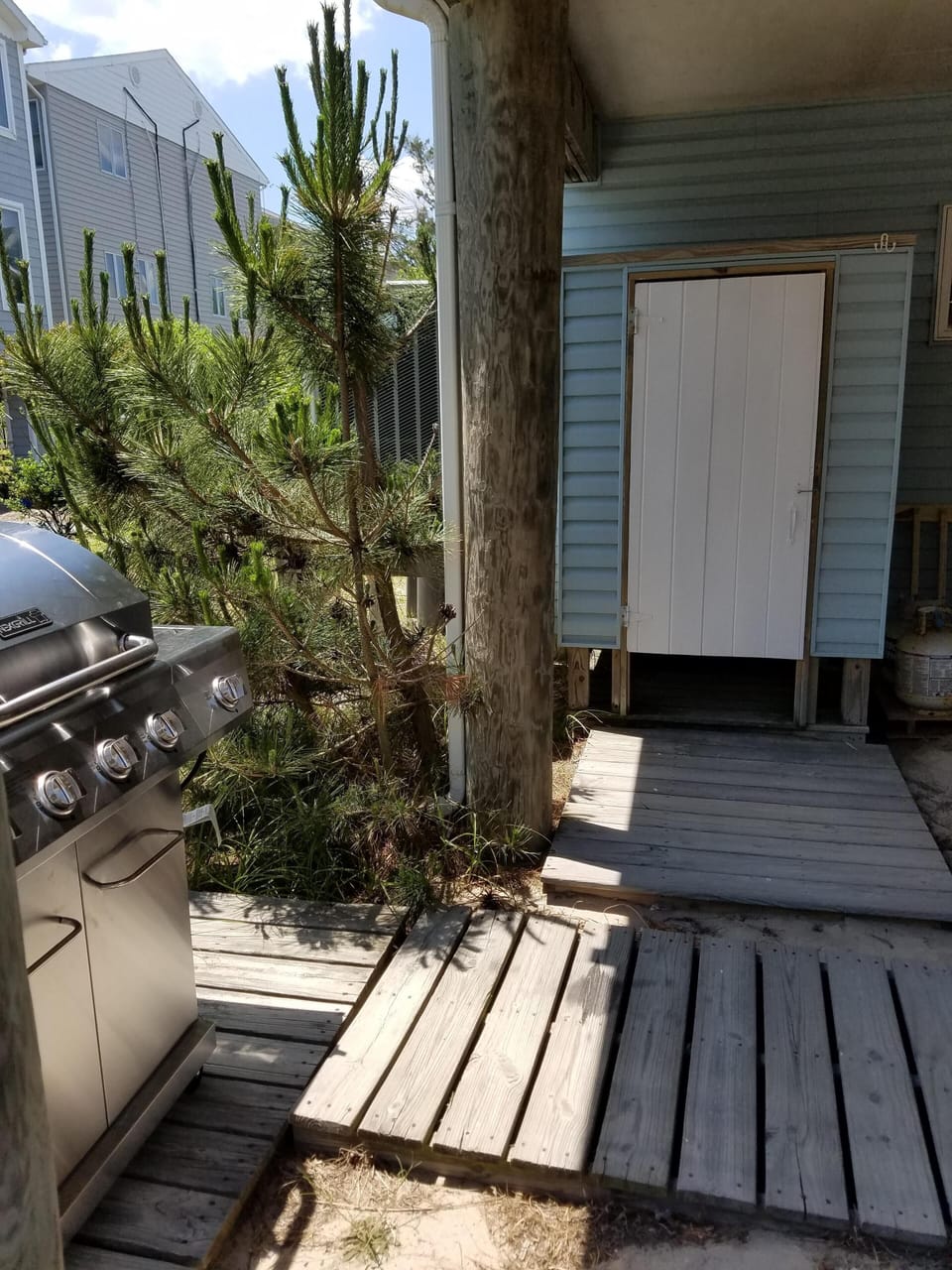 Outside shower under house.